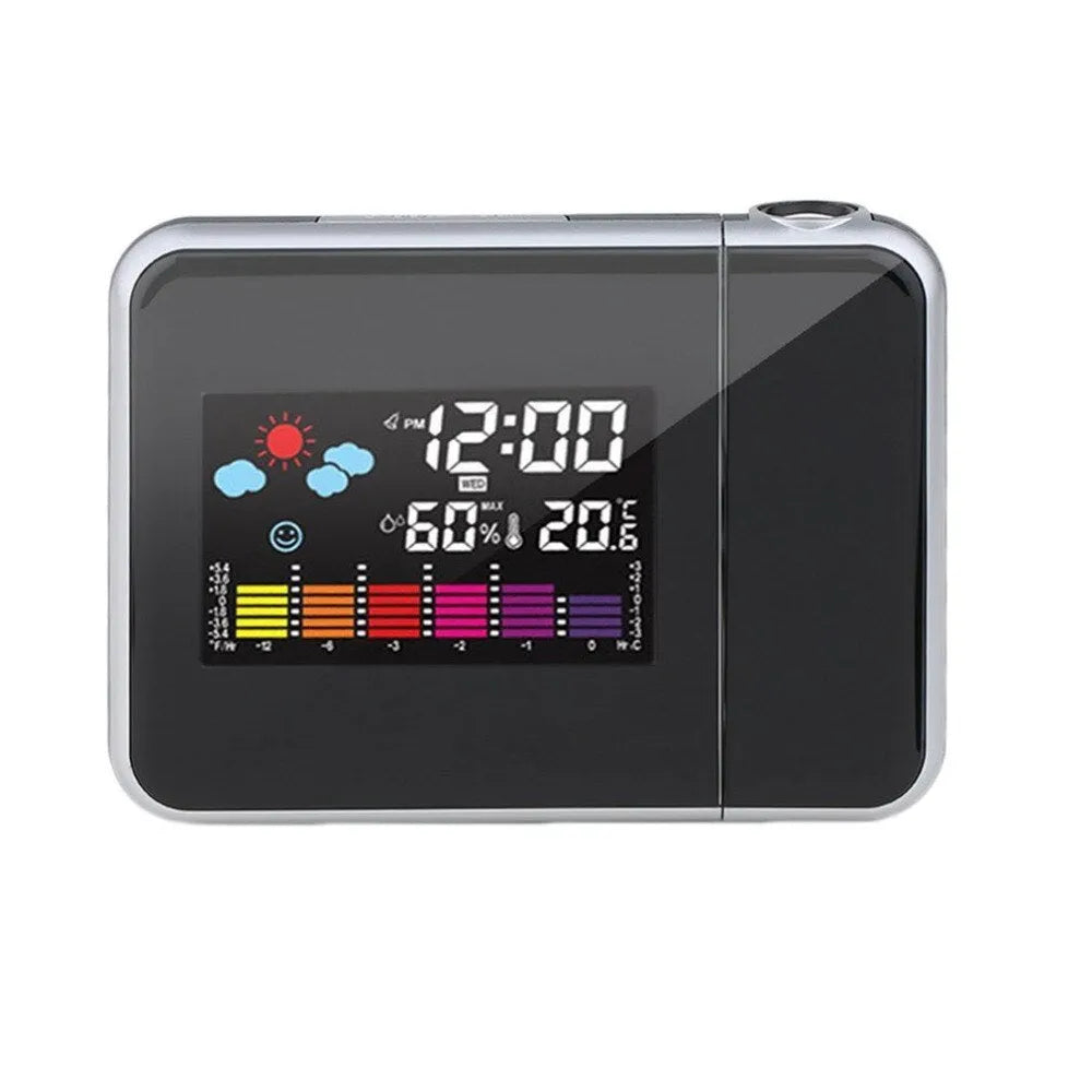 Black digital projection alarm clock showing time display with temperature and humidity readings