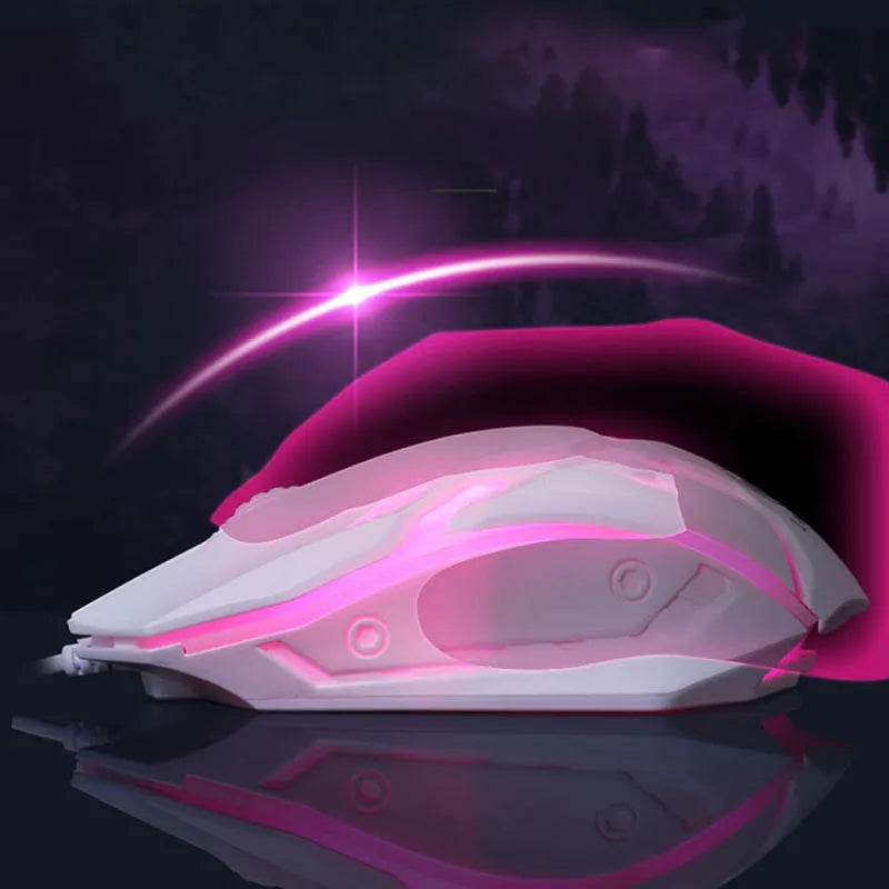 GTX300 black and white wired gaming keyboard and mouse set with coloured backlighting on a desk.