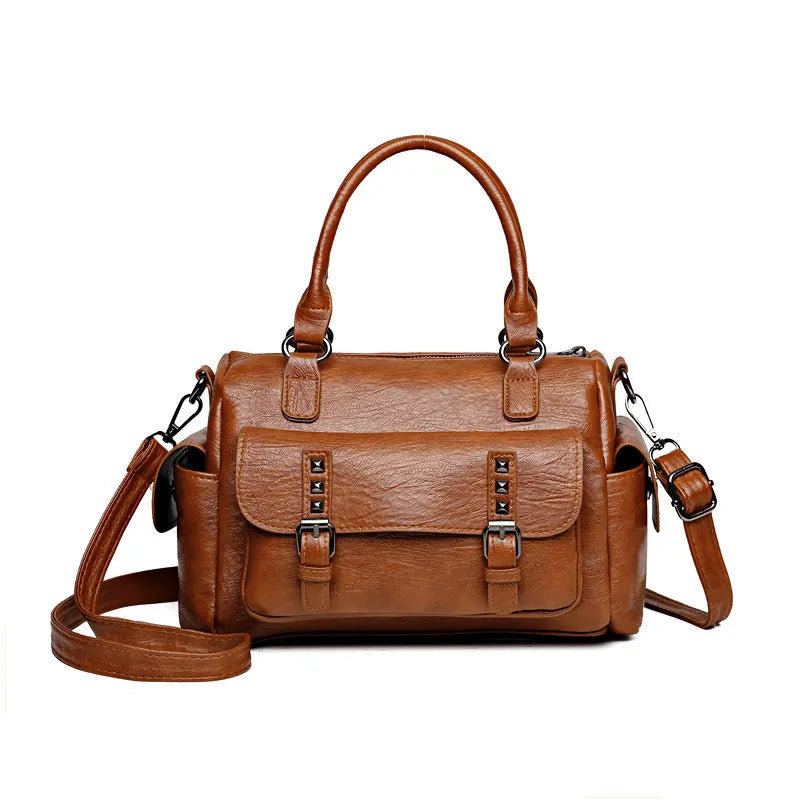 Large capacity vintage messenger bag in horizontal square shape, shown in available colours: blue, gray, camel, red, black, brown.