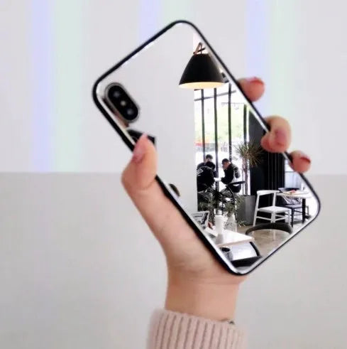 Black compatible iPhone case with integrated mirror for iPhone X, 7 Plus, and 8 Plus models.