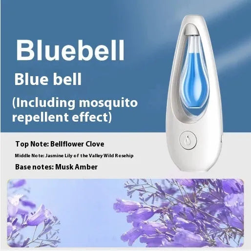 White ultrasonic aroma diffuser with control buttons and mist output, shown with essential oil bottle