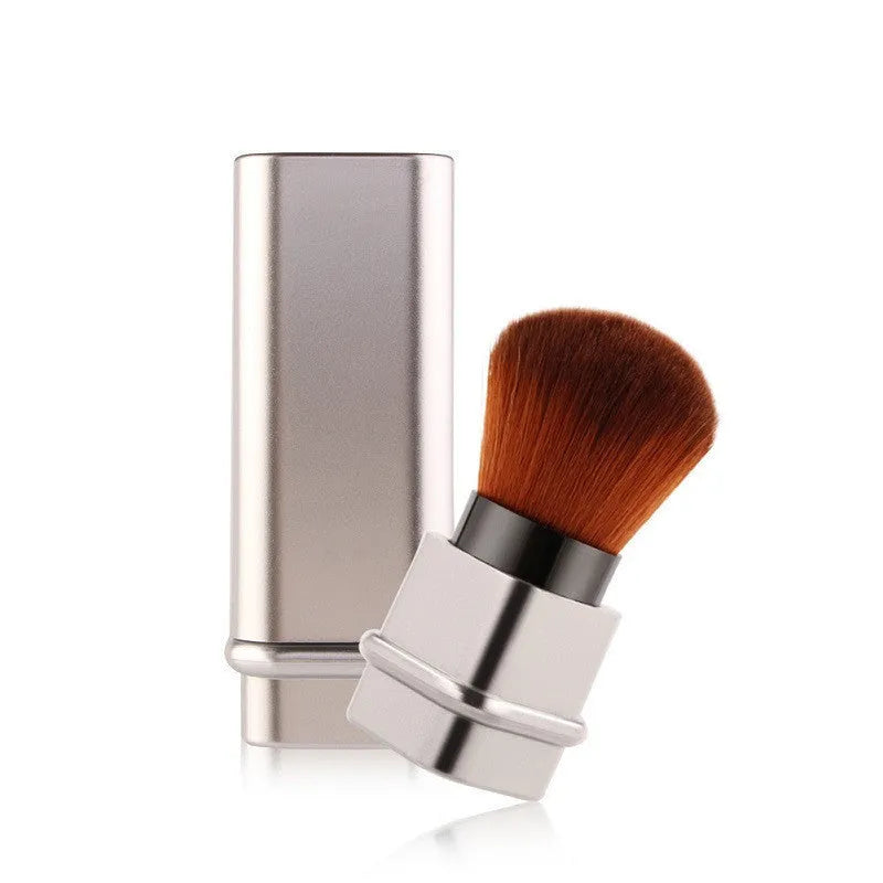 Portable single makeup brush with man-made fibre bristles and plastic handle in gold or silver, 8.1cm size, 40g weight