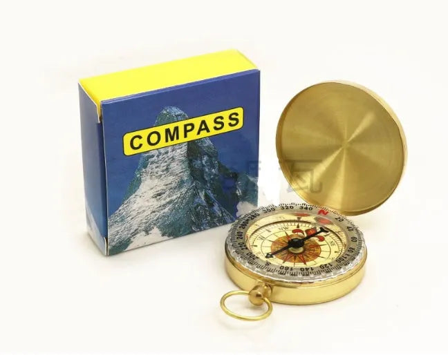 Metal flip compass outdoor pocket watch compass gold colour copper-tone close-up