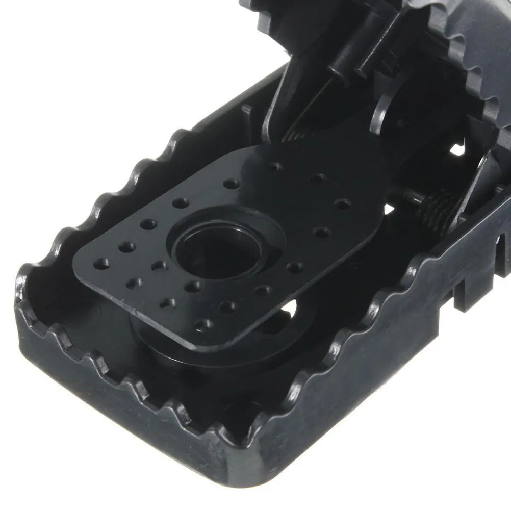 Six black plastic snapping mousetraps with measurements 11cm long by 5.5cm high