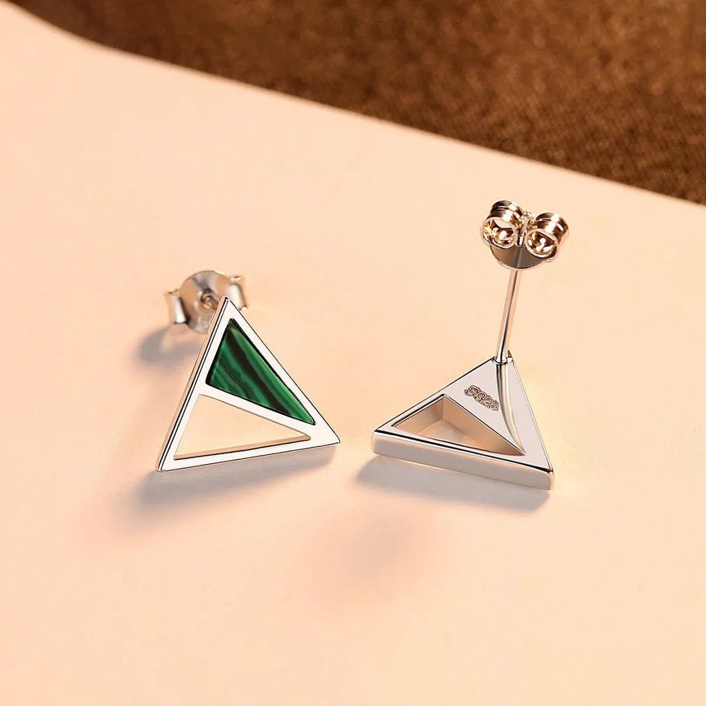 Green malachite stud earrings in silver with a geometric design and pure silver inlay gem setting