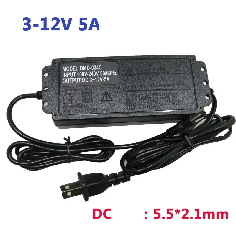 Compact black adjustable power adapter with LED digital display showing voltage output on a white background