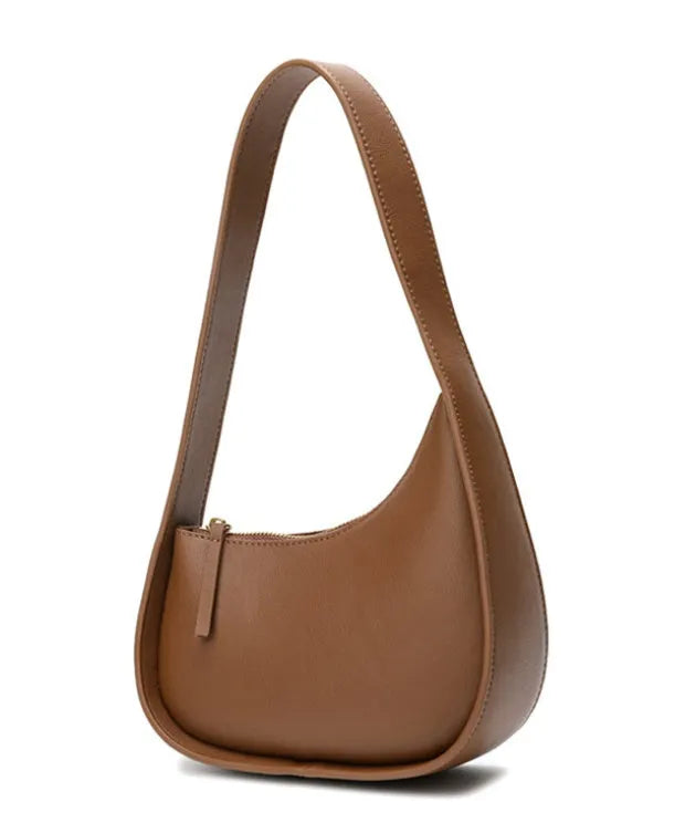 Genuine cowhide leather ladies handbag in half moon shape with wide shoulder strap