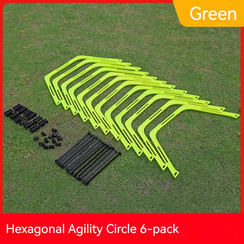 Set of six foldable yellow, green, and orange hexagon agility training rings on grass.