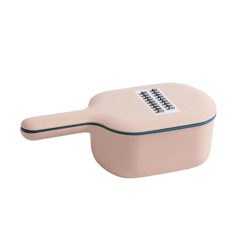 Vegetable cutter with four blades, hand protection, drain basket and bottom basin in dark blue, pink, white or light blue