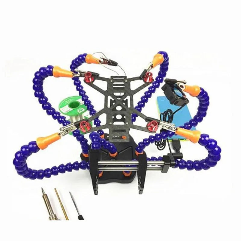 Black aluminium alloy six-claw welding station with multiple adjustable arms on a workbench.
