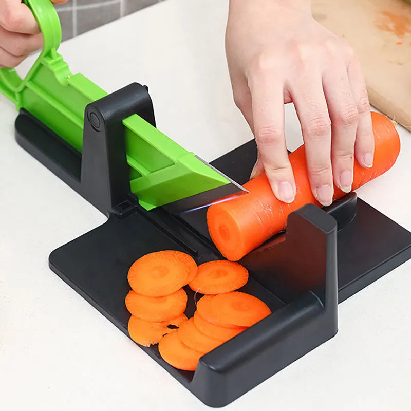 Green and red vegetable cutter with stainless steel blades for cutting carrots and potatoes