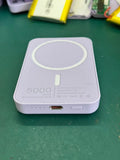 White magnetic wireless charger power bank with 5000mAh capacity measuring 100x65x16mm