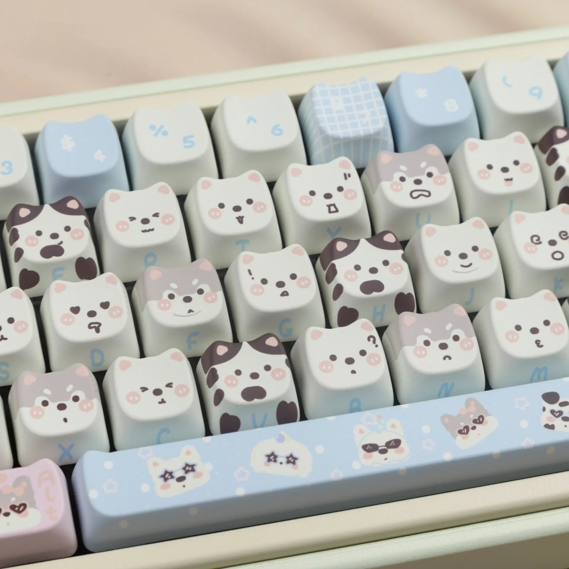 PBT sublimation keycap set showing cat and puppy character designs on mechanical keyboard keys