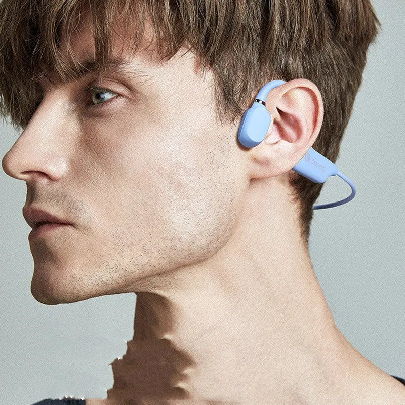 Bone conduction Bluetooth sports headset in a hanging neck design on a person running.
