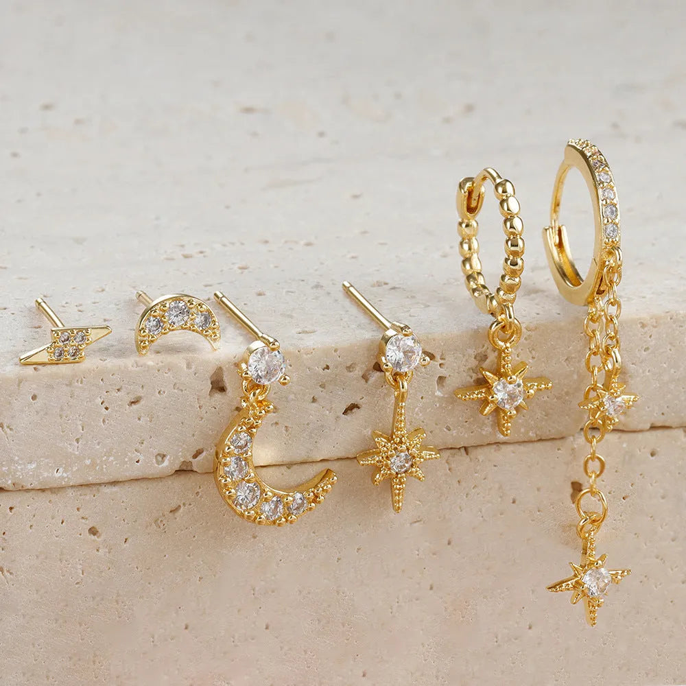 XINGX set of six gold chain tassel earrings with zircon studs for women