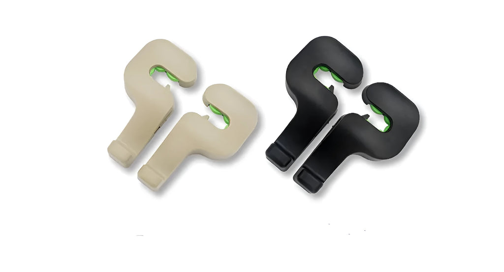 Pair of black plastic concealed car seat back hooks on a car seat back holding a bag