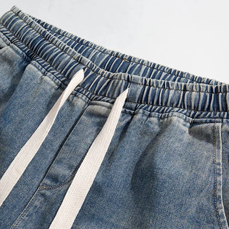 Blue Hong Kong style retro heavy wash distressed loose jeans with fleece lining and ankle banded cuffs