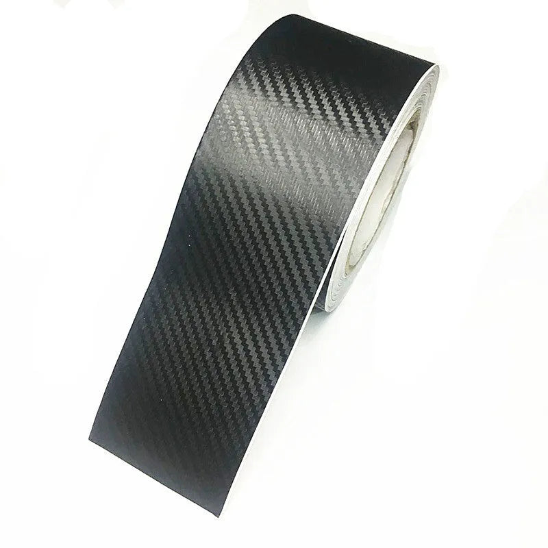 Roll of matte black 3D carbon fibre waterproof protection film for car door sills and bumpers.