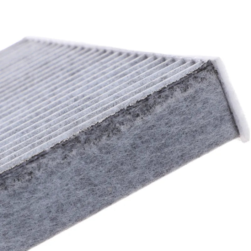 Grey plastic air conditioning filter grid for Geely cars measuring 215mm by 210mm by 30mm.