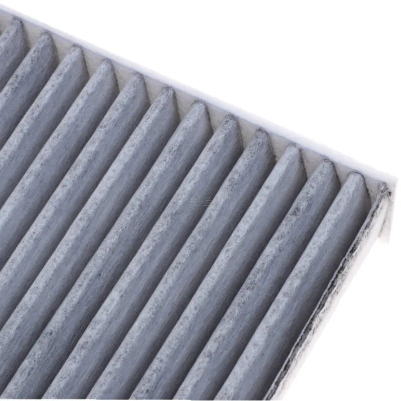 Grey plastic air conditioning filter grid for Geely cars measuring 215mm by 210mm by 30mm.