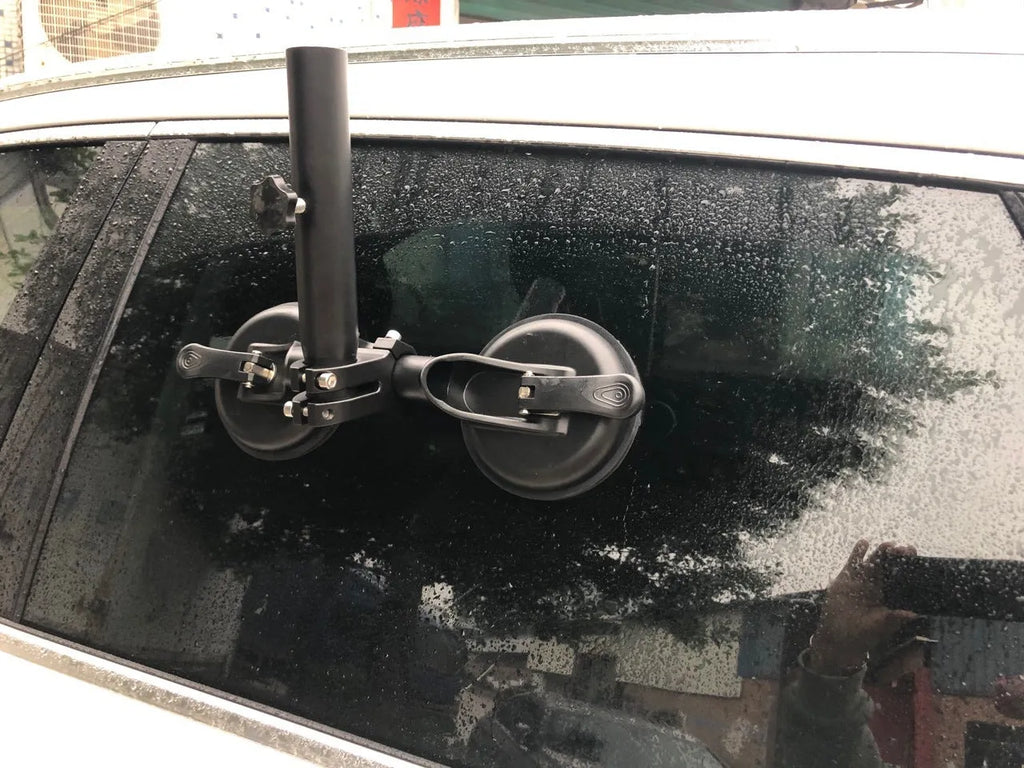 Black off-road car flagpole sucker base with round glass suction cup and rubber disc body.