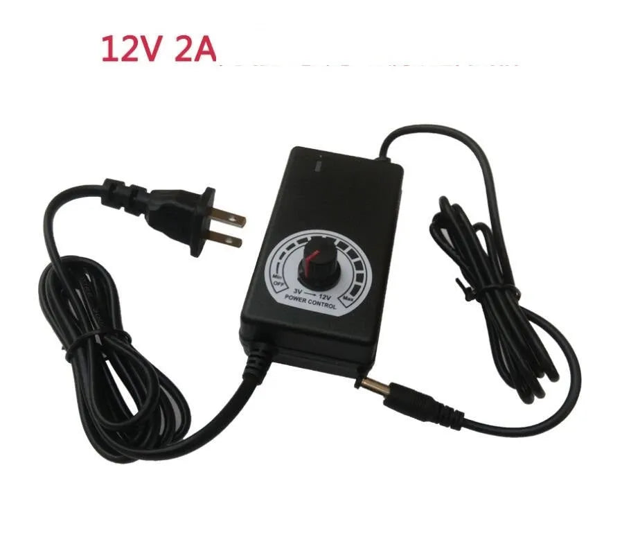 Compact black adjustable power adapter with LED digital display showing voltage output on a white background