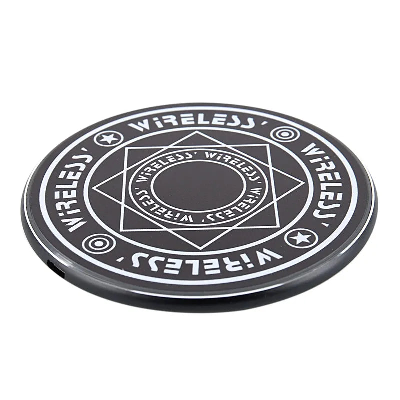 Magic array wireless charger in black with light indicator on desk showing 10W fast charge