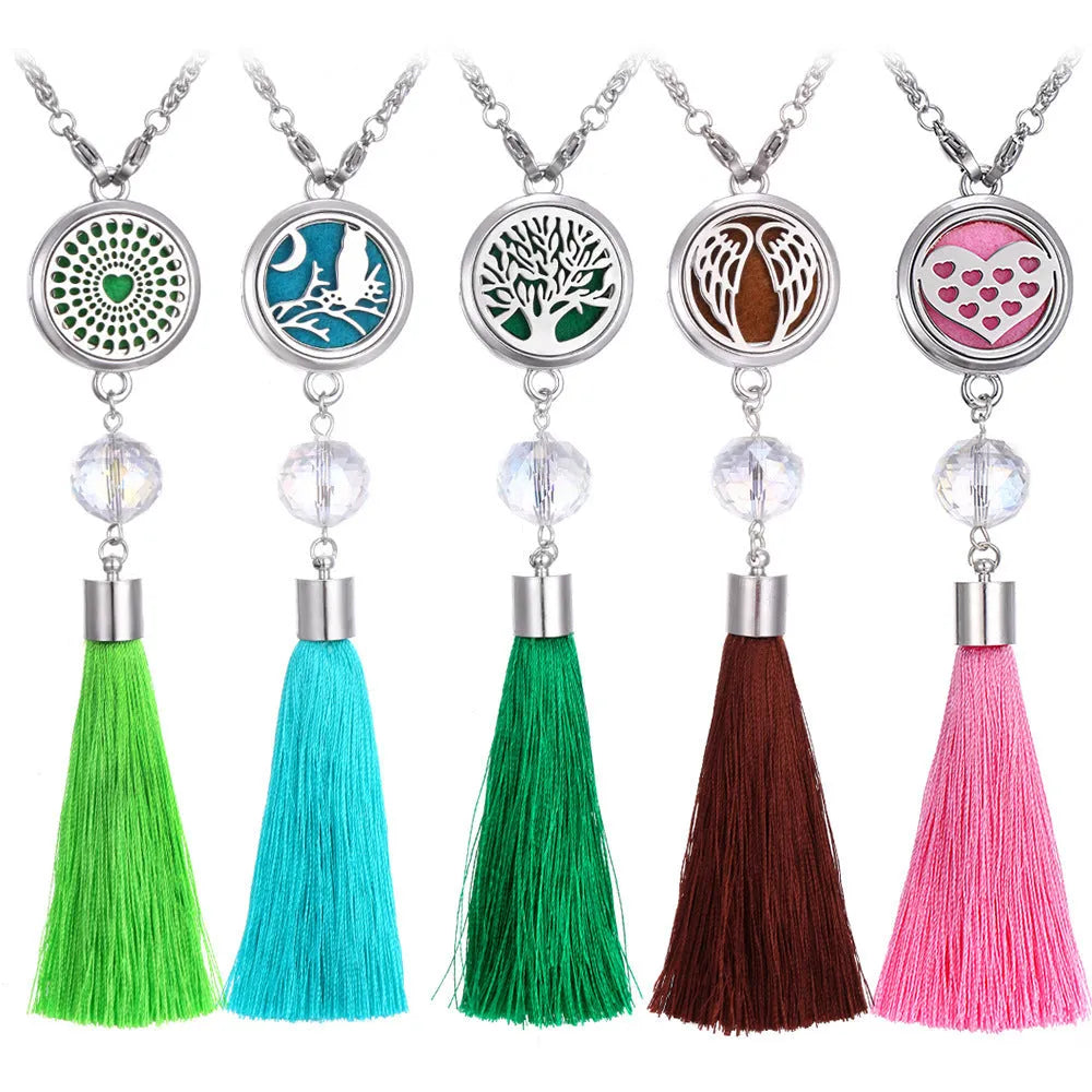 Tassel aromatherapy car pendant with alloy chain hanging from a rear-view mirror.