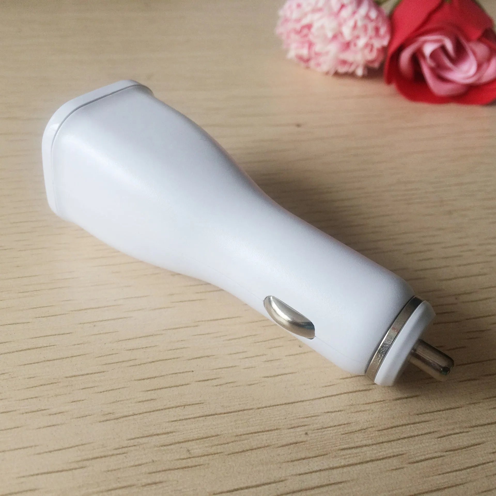 White QC2.0 single port USB car charger for vehicle smartphone charging