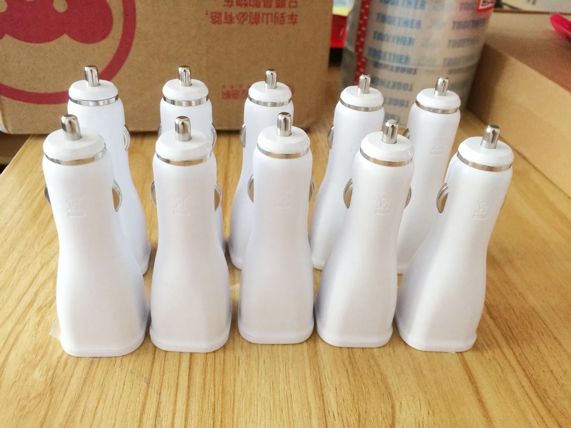 White QC2.0 single port USB car charger for vehicle smartphone charging