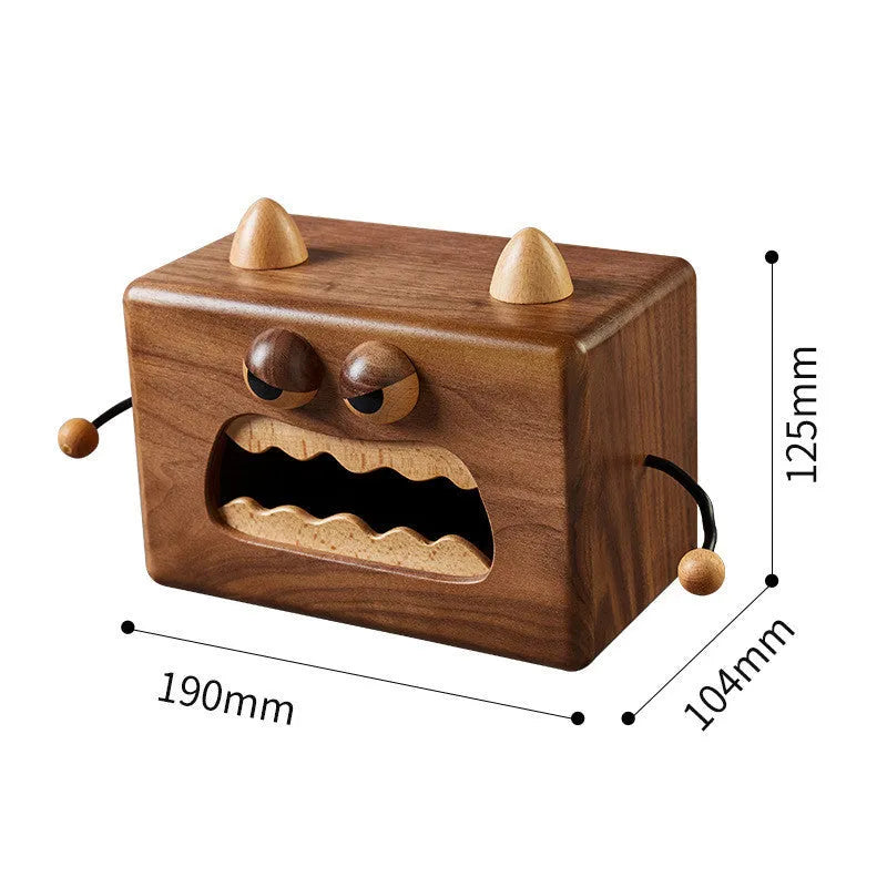 Wooden tissue box with cartoon monster design in beech and walnut colours