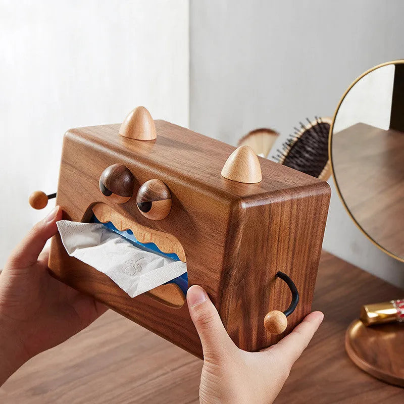 Wooden tissue box with cartoon monster design in beech and walnut colours