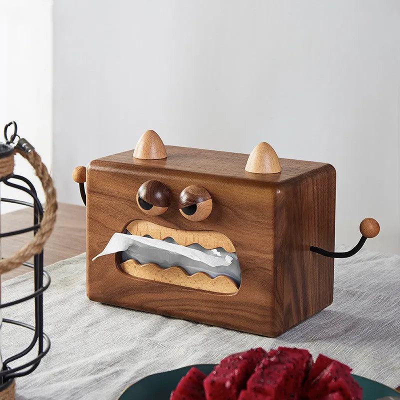 Wooden tissue box with cartoon monster design in beech and walnut colours