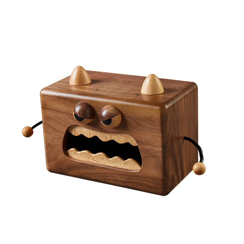 Wooden tissue box with cartoon monster design in beech and walnut colours