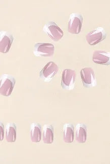 White fake nails with black and white plaid pattern, 24 pieces in an open box.