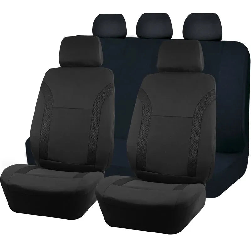 Polyester car seat cover with eyelet stitch detail in blue, red, black, or grey colour options.