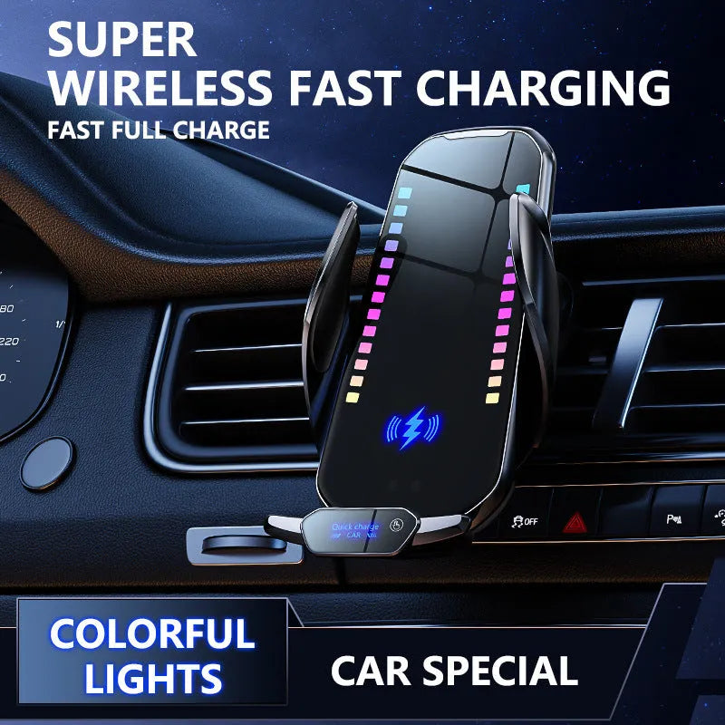 Silver car phone holder with wireless charging pad and electric clamp mounted on a car dashboard.