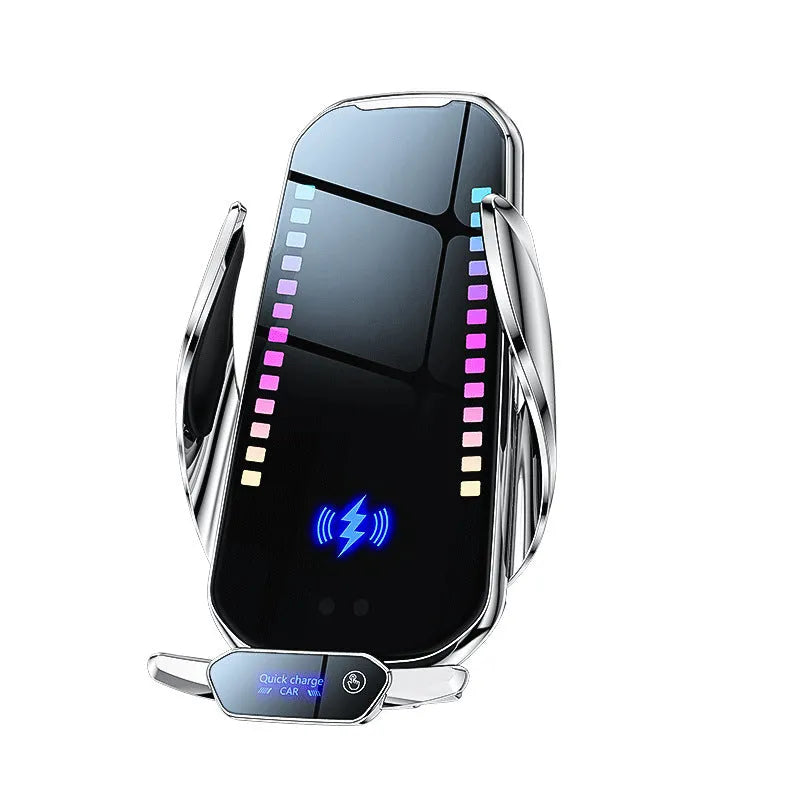 Silver car phone holder with wireless charging pad and electric clamp mounted on a car dashboard.