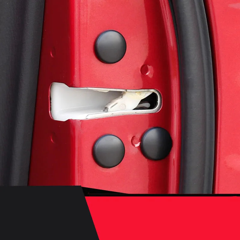 12 black ABS plastic car door screw cap protective covers on a Mazda door panel