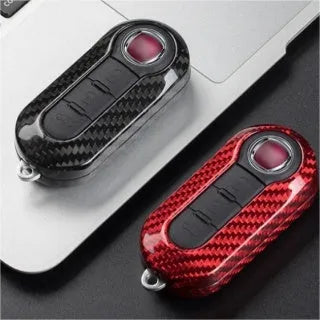 Xiaomi car key replacement shell in carbon fibre black, glass fibre red, and glass fibre silver-black finishes.
