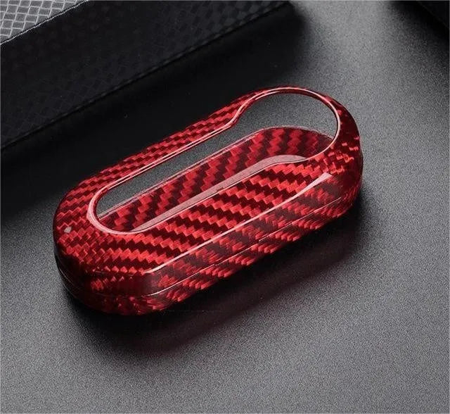 Xiaomi car key replacement shell in carbon fibre black, glass fibre red, and glass fibre silver-black finishes.