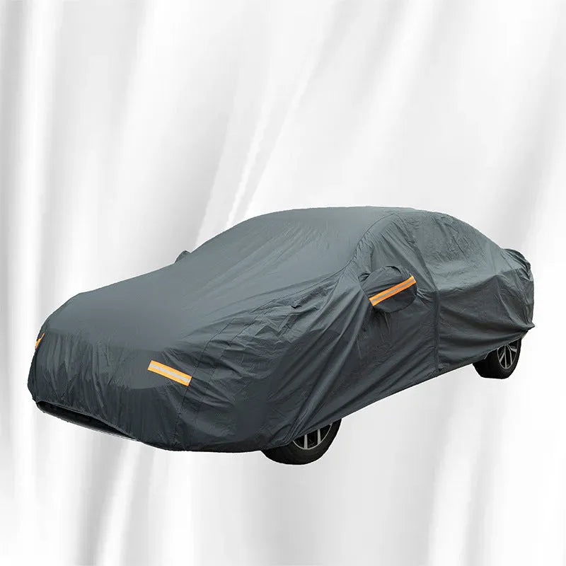 Grey PVC car cover for Volkswagen vehicles shown in size S, M, L, XL, or 2XL for rain and sun protection.