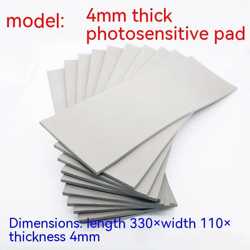 Black and grey plastic photosensitive seal mat for pottery and calligraphy art, showing 330mm by 110mm size.