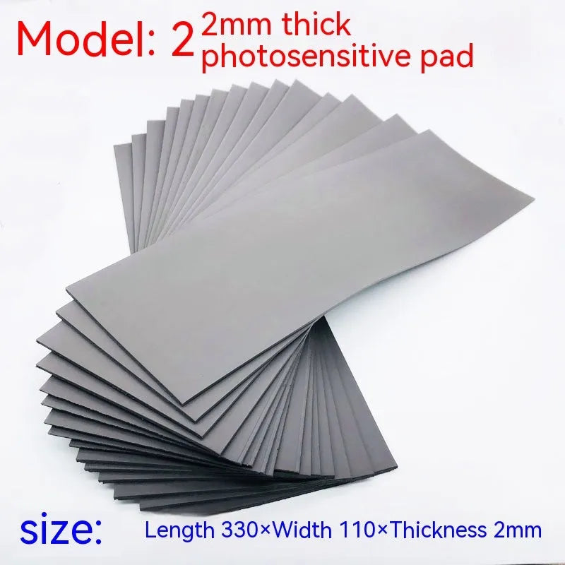 Black and grey plastic photosensitive seal mat for pottery and calligraphy art, showing 330mm by 110mm size.