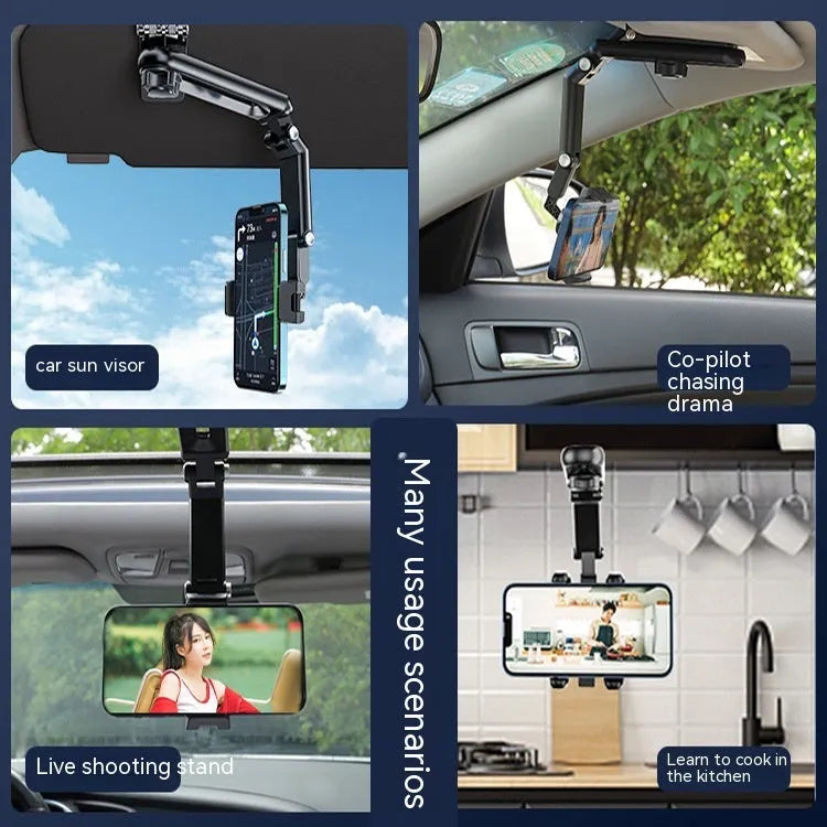 A black and grey car phone holder bracket clipped onto a vehicle air vent.