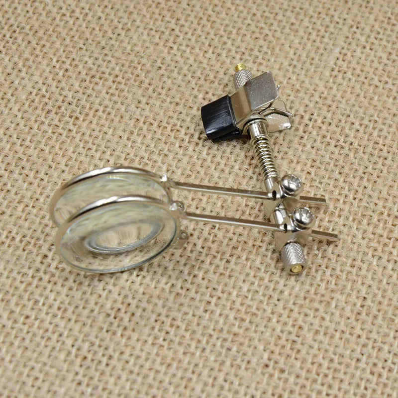 Metal clip-on magnifying glasses attachment for spectacles with glass lenses