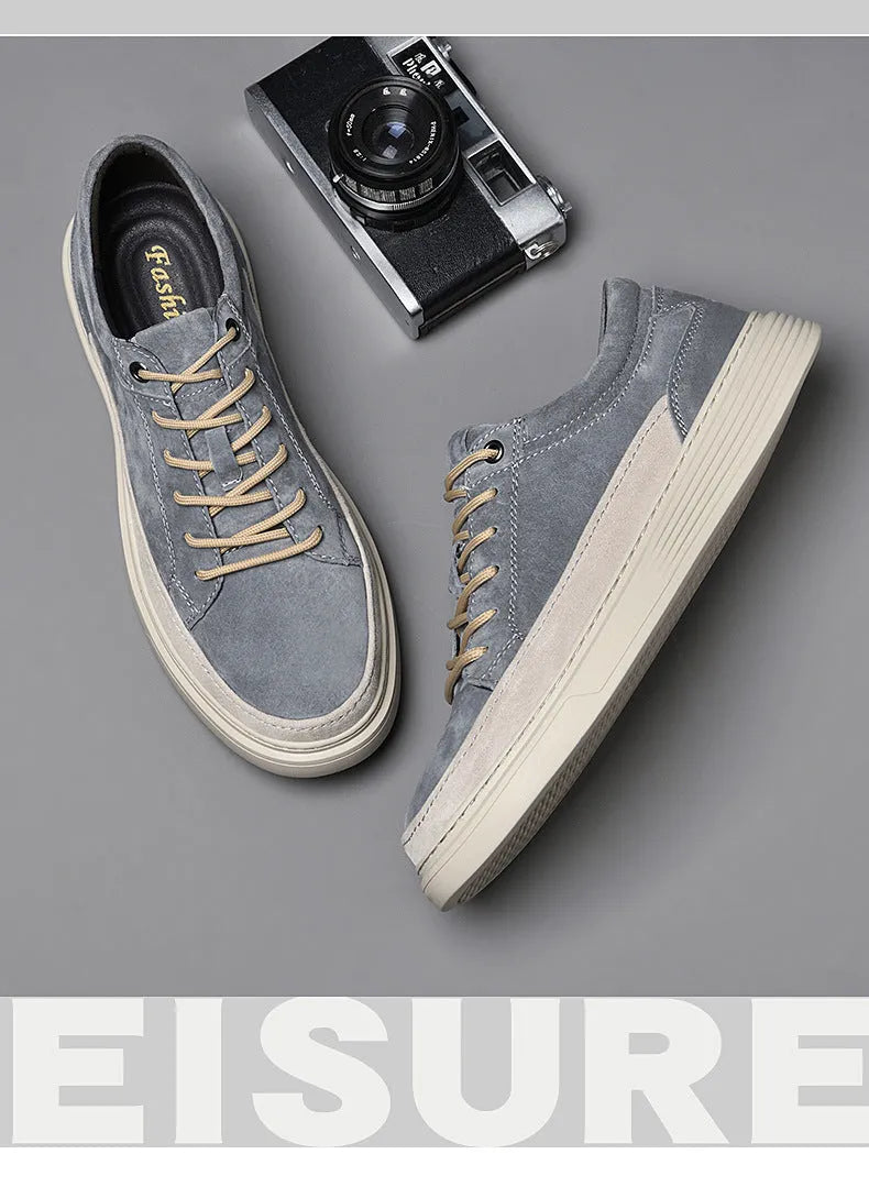 Men's grey casual skate shoes with pigskin upper and rubber sole lace-up design