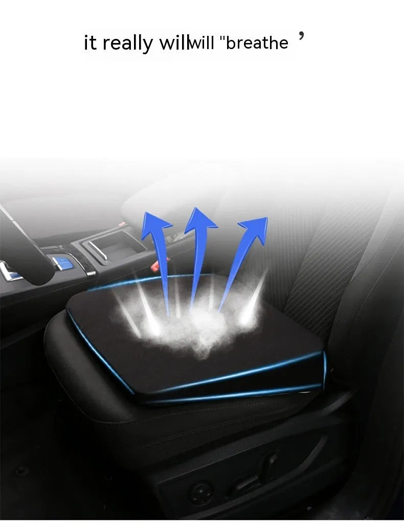 Black car seat cushion for height adjustment measuring approximately 42x39x6cm