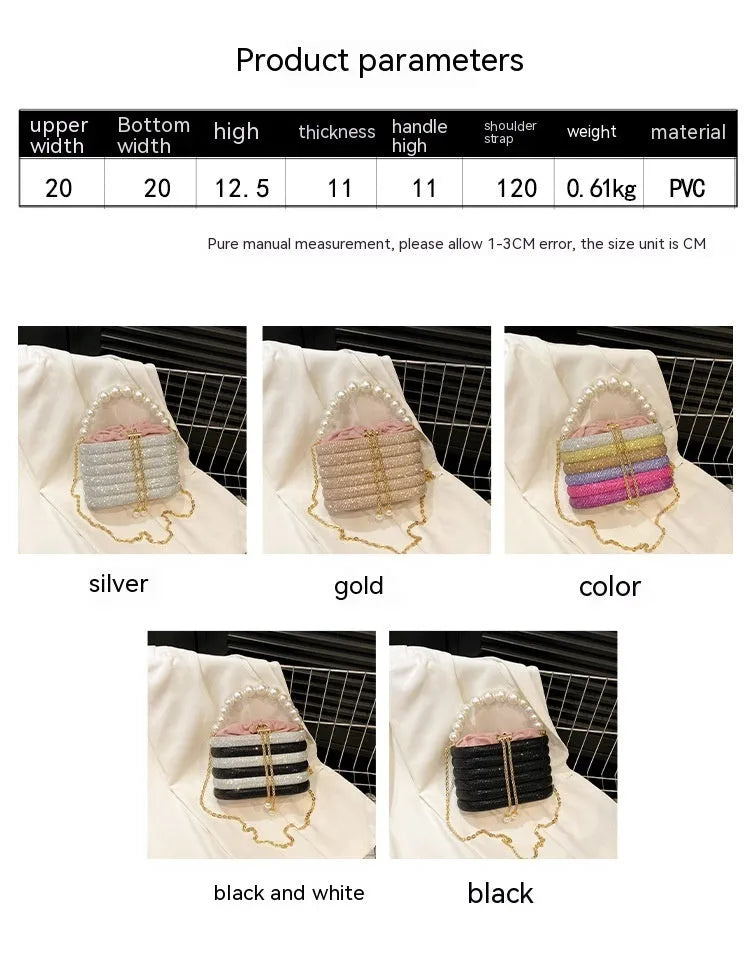 Women's black one-shoulder crossbody bag with pearl beading on the front.