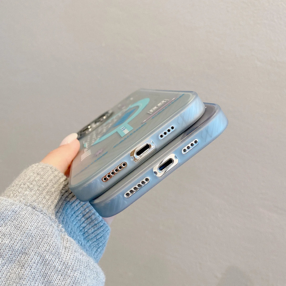 Magnetic frosted iPhone case for 15 Pro Max in black, grey, and light greenish blue with PC anti-fingerprint cover